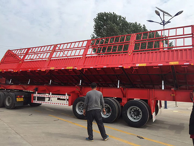 Flip dump semi-trailer